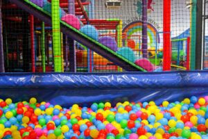 A colorful ball pit filled with numerous balls, creating a playful and vibrant atmosphere.